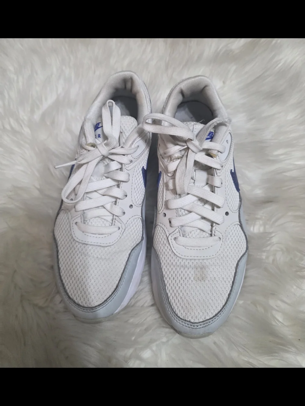 Nike Women’s Cream Sneakers with Metallic Blue Swoosh